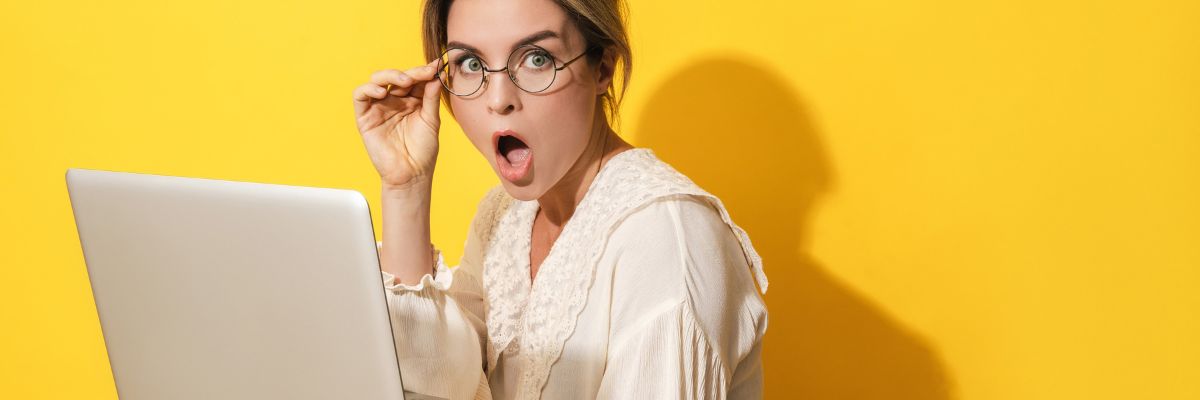 girl with glasses on laptop