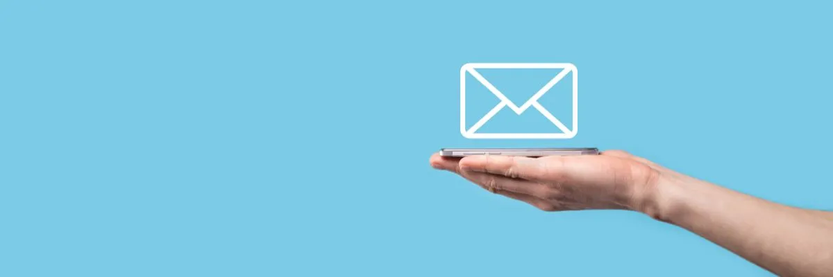 hand holding email letter icon